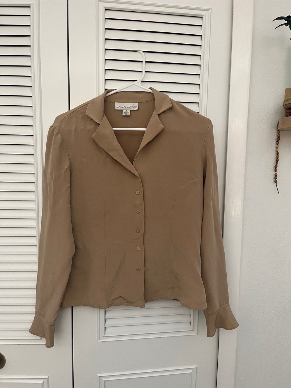 tan blouse